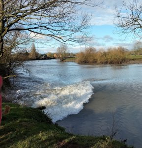 Severn bore rushes past